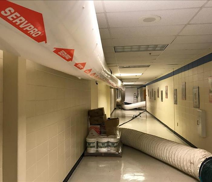 Air ducts setup in the hallway of a Cumming, GA business