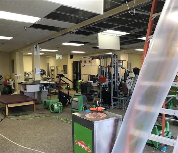 SERVPRO drying a water loss at a gym